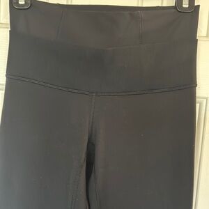 Lululemon Black High-Waisted Leggings Size 4 soft and stretchy.
